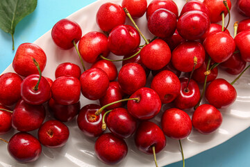 Plate with sweet cherries, closeup