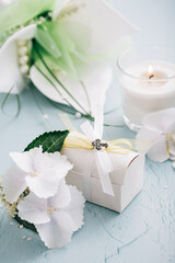 Confirmation or First holy communion concept  - small present with candle and flowers