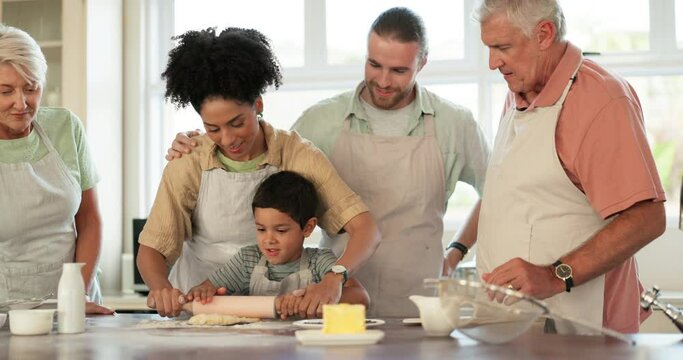Parents, grandparents and kids with a blended family baking food in a kitchen of their home together during a visit. Love, learning and children in a house with happy relatives for cooking education