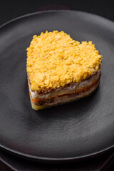 Delicious fresh mimosa salad with canned fish, egg, moinese, cheese, salt and spices