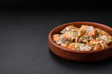 Delicious boiled beef or pork tongue sliced with carrots, onions, sour cream and spices