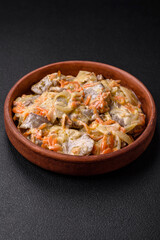 Delicious boiled beef or pork tongue sliced with carrots, onions, sour cream and spices