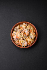 Delicious boiled beef or pork tongue sliced with carrots, onions, sour cream and spices