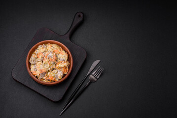 Delicious boiled beef or pork tongue sliced with carrots, onions, sour cream and spices