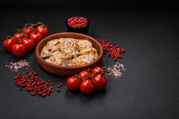 Delicious boiled beef or pork tongue sliced with carrots, onions, sour cream and spices