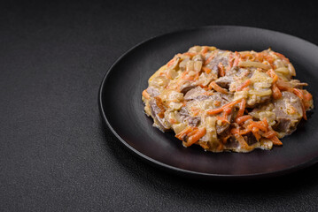 Delicious boiled beef or pork tongue sliced with carrots, onions, sour cream and spices