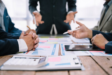 business team discuss with new startup project Idea presentation, analyze planning and financial statistics and investment market at office.