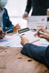 Business team present. professional investor working new start up project. Finance managers meeting.using smart phone and laptop and digital tablet computer in modern office. .