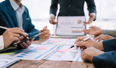 Business team present. professional investor working new start up project. Finance managers meeting.using smart phone and laptop and digital tablet computer in modern office. .