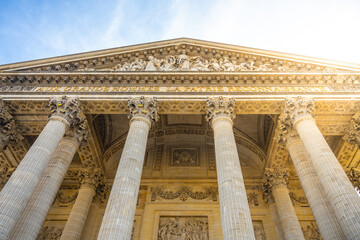 Obraz premium Front view of Tympanum and massive ancient columns of Pantheon in Paris, France