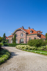 Fototapeta na wymiar Historic house in the Snouck van Loosen park in Enkhuizen, Netherlands