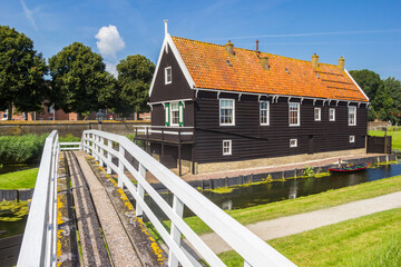 Small bridge leading to a wooden house in Enkhuizen, Netherlands