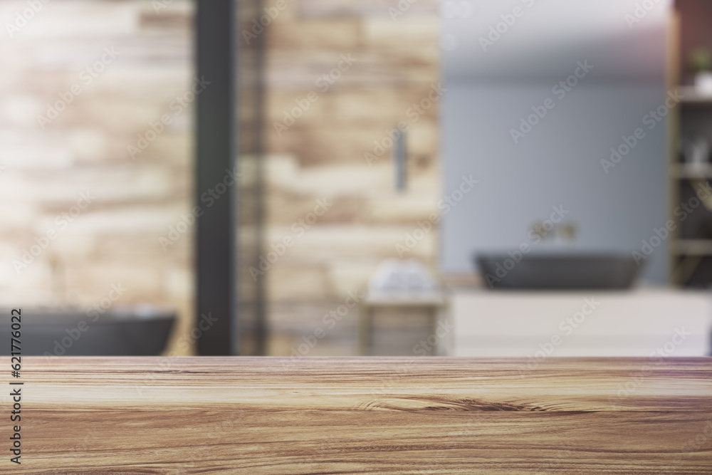 Poster front view of empty wooden countertop in bathroom interior with blurred background, product presenta
