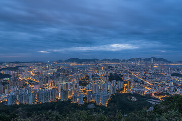 Fototapeta na wymiar Aerial City Night view of Hong Kong City with sky and building and street