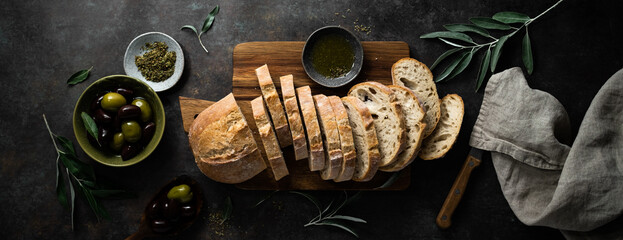Ciabatta stock image. Ciabatta bread traditional Italian cuisine. Banner top view - obrazy, fototapety, plakaty
