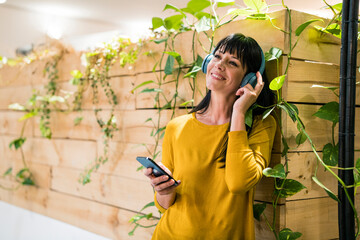 Smiling mature man and woman hugging each other