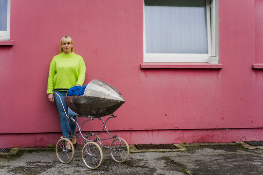 Mature man wearing backpack entering cave, Tuscany, Italy
