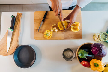 Smiling young businesswoman with brown long hair