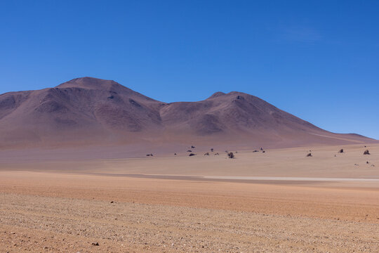 Picturesque Salvador Dali Desert, just one natural sight while traveling the scenic lagoon route through the Bolivian Altiplano in South America 