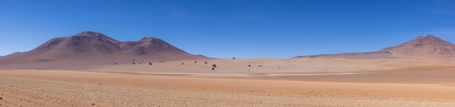 Picturesque Salvador Dali Desert, just one natural sight while traveling the scenic lagoon route through the Bolivian Altiplano in South America - Panorama