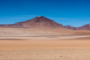 Fototapeta na wymiar Picturesque Salvador Dali Desert, just one natural sight while traveling the scenic lagoon route through the Bolivian Altiplano in South America 