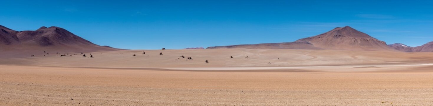 Picturesque Salvador Dali Desert, just one natural sight while traveling the scenic lagoon route through the Bolivian Altiplano in South America - Panorama