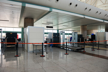 Airport security check point with scanner machine, computer, etc
