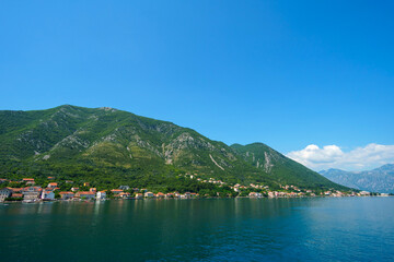 seascape during a voyage on a yacht in the Bay of Kotor, Montenegro, bright sunny day, mountains and sea, travel