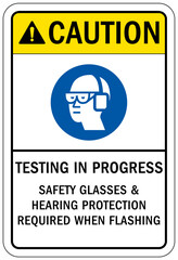 Testing in progress warning sign and labels testing in progress. Safety glasses and hearing protection required when flashing