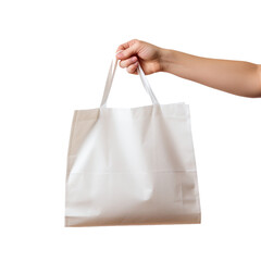 hand holding reusable shopping bag isolated