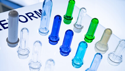 PET plastic bottle preforms before blow molding. Packaging industry. PET preforms from preforms...