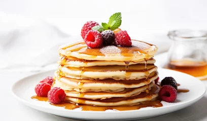 Foto op Plexiglas pancakes with raspberries in white plate, raspberries on top of pan cakes with honey © pankajsingh