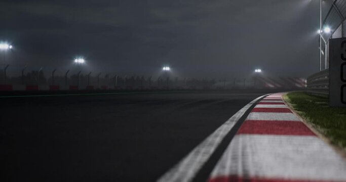 Two modern race cars racing on a speedway at night