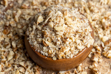 Crushed dried walnuts on the table
