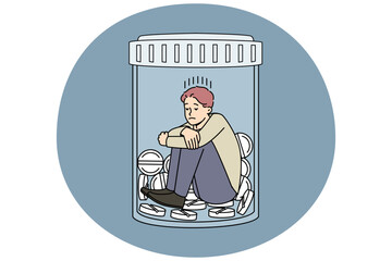 Unhappy man sitting in bottle with medicines suffer from depression or nervous breakdown. Upset stressed male struggle with drug and medication addiction. Vector illustration.