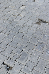damaged and broken concrete tile road, close-up