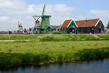 Fototapeta premium View at the Windmills of Zaanse Schans near Amsterdam on Holland