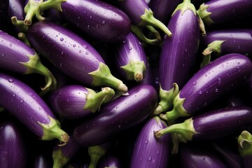 a pile of purple eggplants