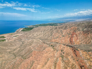 
Top view, bird's eye view, Skazkak valley in Kyrgyzstan, chalk mountains with dried up river and...