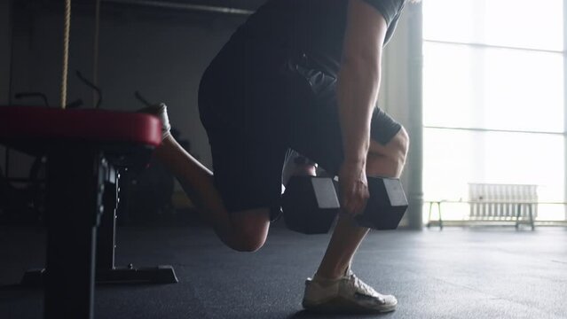 Power Workout In Fitness Center, Brawny Man Training With Weights, Doign Squats On One Leg