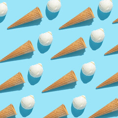 trendy seamless pattern of vanilla ice cream and hard shadow isolated on blue background, creative...