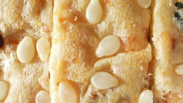 A macro video with a probe lens, Capture the intricate details of whole wheat bread up close. Revealing the texture, color, and composition of the bread in a unique and visually appealing way. 4K
