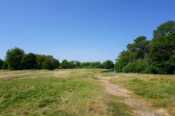 Outdoor green space for walking and cycling. The Itchen Way trail following the river Itchen and countryside in Hampshire England 