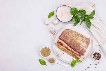 Piece of salty high-fat meat cooked with spices. Salo, bacon, lard, silverside, gammon