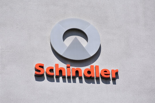 Schindler Group signage, emblem, logo, sign on the facade. Elevator manufacturer company. WARSAW, POLAND - JUNE 3, 2023