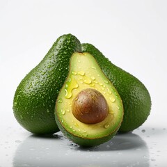 Ripe avocados with water drops on a white background