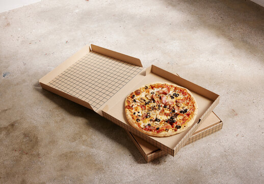Mockup of customizable cardboard pizza box, open, on top of another box