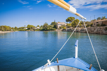 L'Ametlla de Mar, Catalunya, Spain - July 7th, 2023: Skyline of the town seen from the fishing port