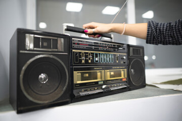 an old cassette recorder, a music center with a radio receiver