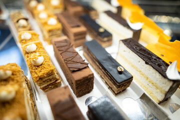 various delicious sweet pastries in the shop window.